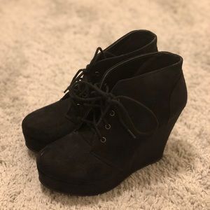 Black wedge booties